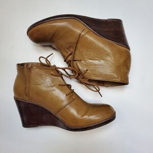 Torrid tan faux leather wedge booties lace up